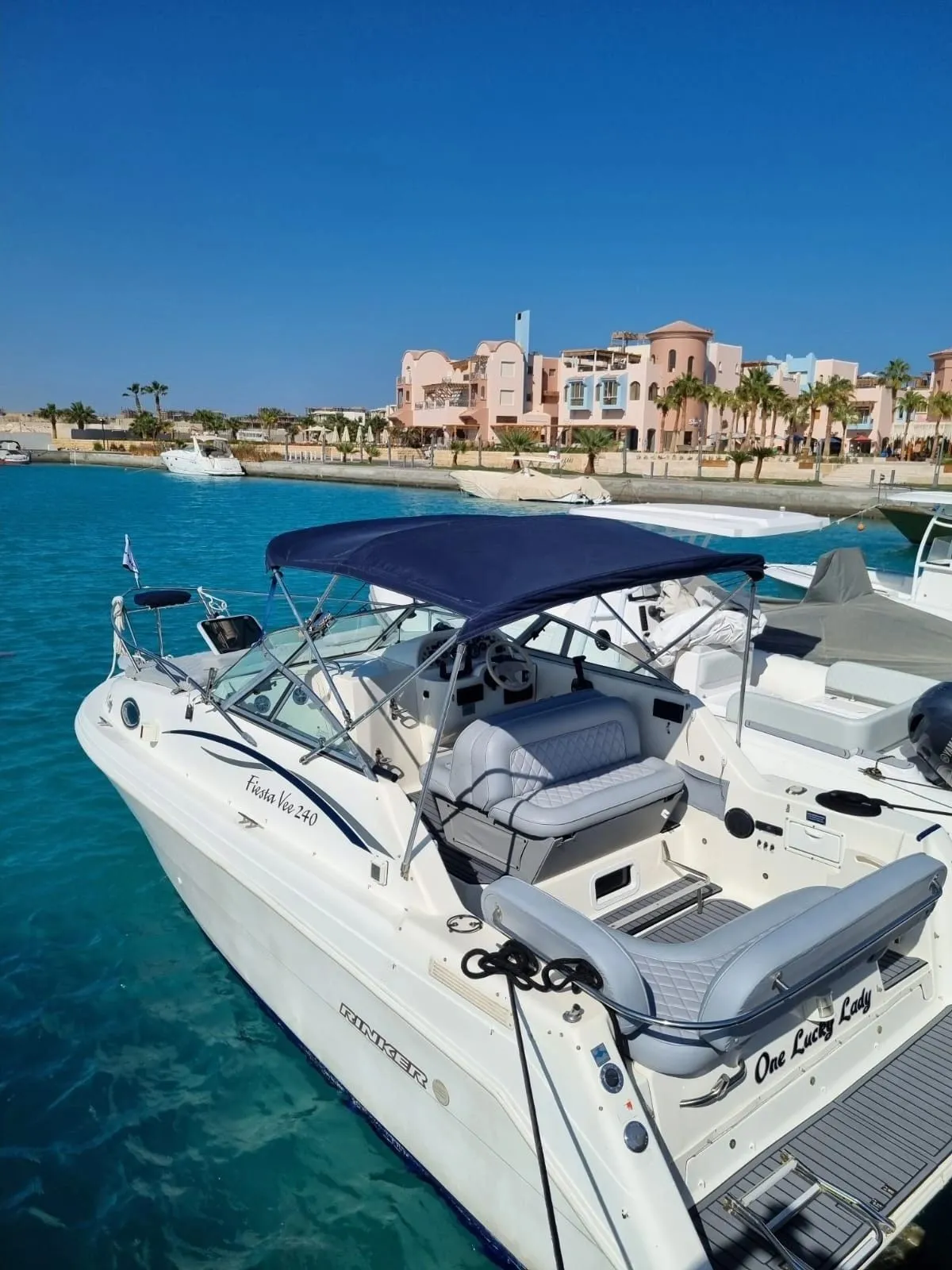 Private boat resting on calm turquoise water near the Hurghada coast