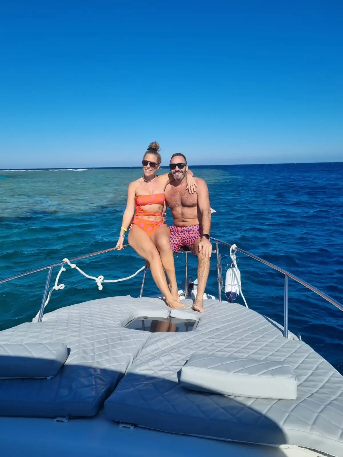 Guests relaxing on the spacious bow of a Red Sea charter for groups